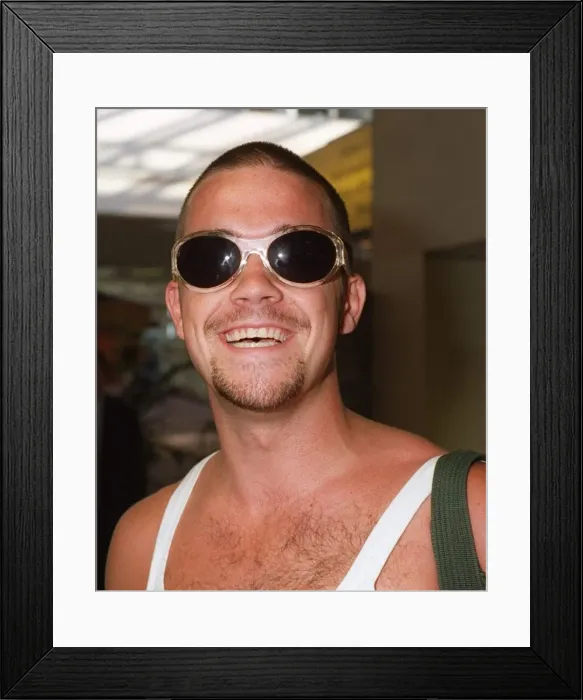 Framed Print : Robbie Williams arrives Glasgow Airport T In The Park festival August 1995