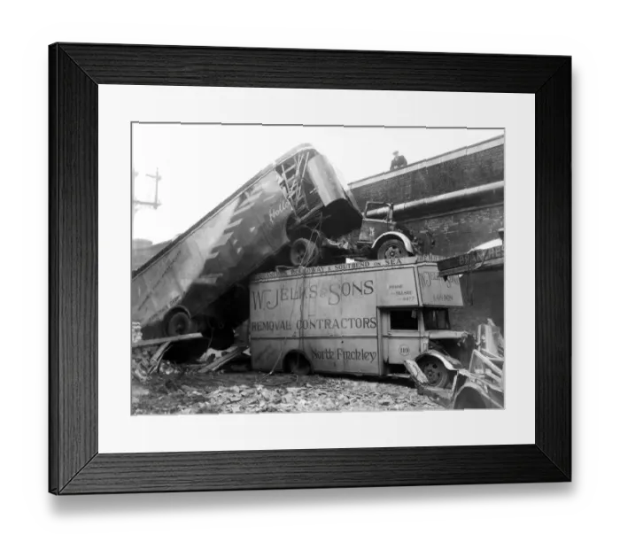 Framed Print : WW2 Air Raid Damage Damaged trucks after the blitz circa 1941