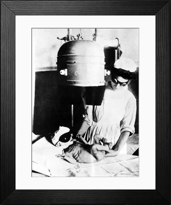 Framed Print : World War One - A nurse working for the Save The Children Fund wearing protective goggles