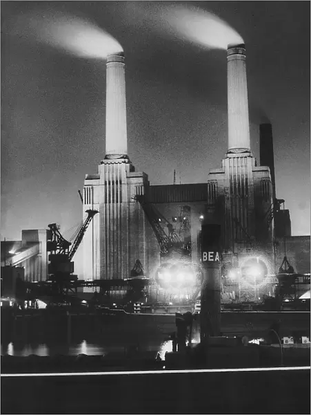 Battersea Power Station at night July 1950, Coal ships unload at Battersea Power Station