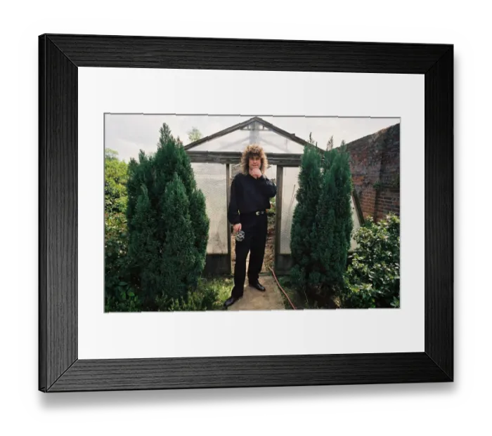 Framed Print : Black Sabbath singer Ozzy Osbourne in the garden of his home. May 1988