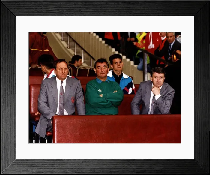 Framed Print : Brian Clough, Nottingham Forest manager, sitting on bench with club officials during FA