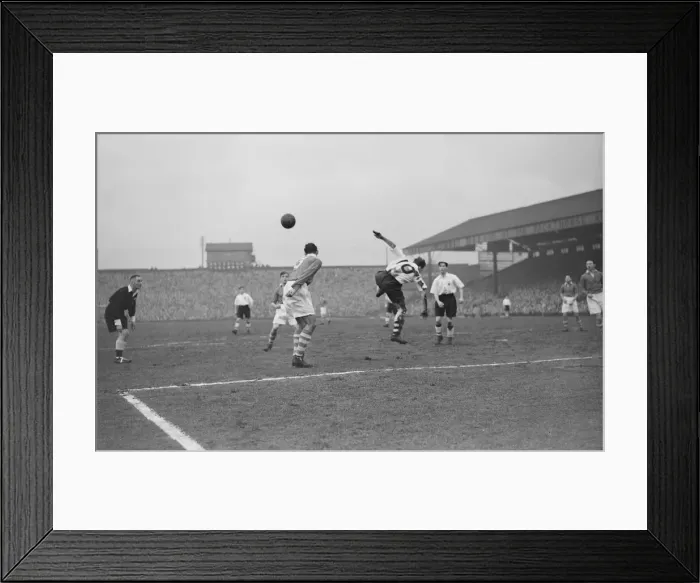 Framed Print : Bolton Wanderers v Charlton Athletic Division One. The ball is cleared away to safety by Framed Print : Bolton Wanderers v Charlton Athletic Division One. The ball is cleared away to safety by