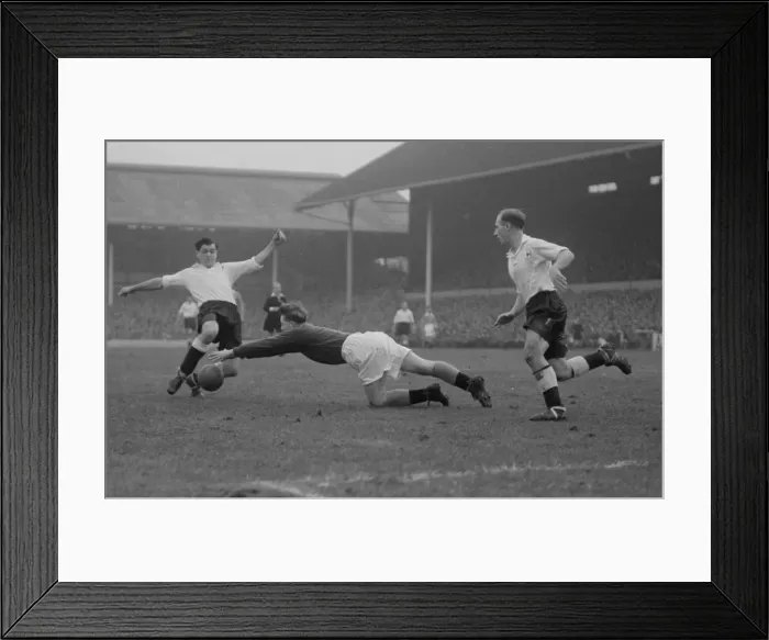Framed Print : Tottenham Hotspur v Blackpool Division One. Blackpools goal keeper dives to the feet of Framed Print : Tottenham Hotspur v Blackpool Division One. Blackpools goal keeper dives to the feet of