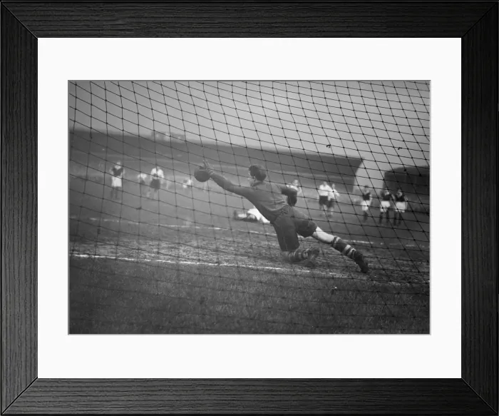 Framed Print : Preston North End v Burnley Division One Desmond Thompson Burnley goalkeeper dives in Framed Print : Preston North End v Burnley Division One Desmond Thompson Burnley goalkeeper dives in