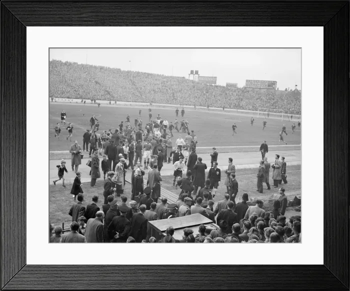 Framed Print : Football 1954  /  55 Season. Large crowds and photographers gather on the pitch at Stamford