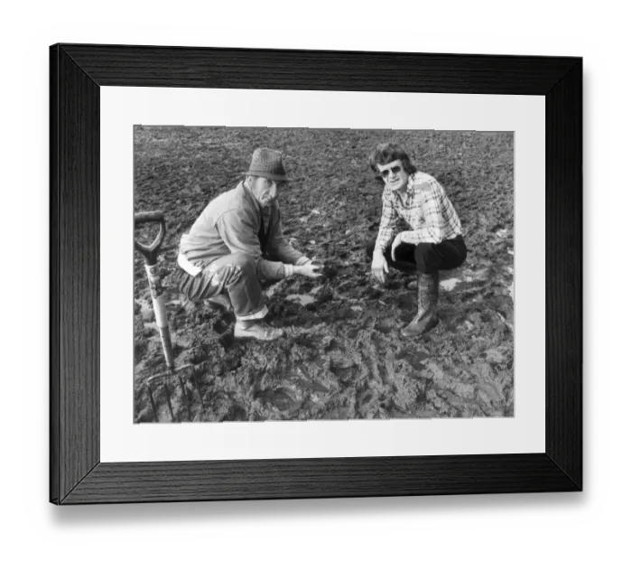 Framed Print : A concerned Eddie McCreadie (R) Chelsea Football Club manager examines the surface water Framed Print : A concerned Eddie McCreadie (R) Chelsea Football Club manager examines the surface water