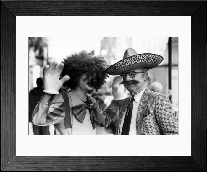 Framed Print : Archie MacPherson Sports Commentator with glasgow student Finlay Jollife dressed as a Framed Print : Archie MacPherson Sports Commentator with glasgow student Finlay Jollife dressed as a