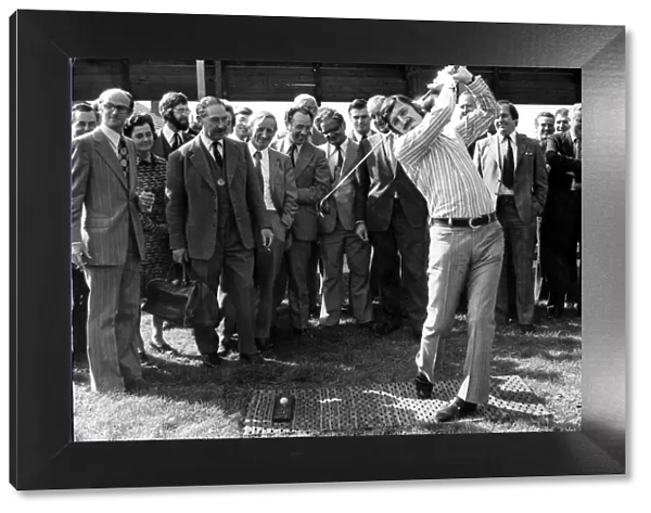 Jimmy Hill swings into action to open the golf driving range at Packington Park