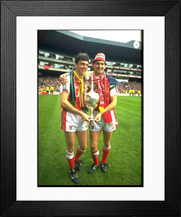 Framed Print : Arsenal captain Tony Adams with teammate David O Leary parade around Highbury with Framed Print : Arsenal captain Tony Adams with teammate David O Leary parade around Highbury with