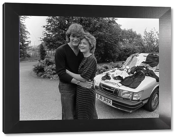 Footballer Glenn Hoddle with wife Ann and new car 1982 a Saab 900 turbo amongst