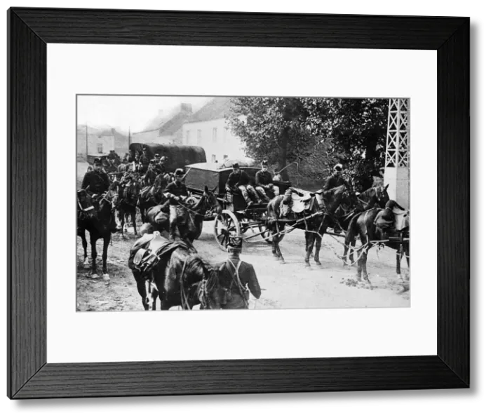 Framed Print : World War One - Belgian troop on horseback guard a food convoy carriage on its way to Framed Print : World War One - Belgian troop on horseback guard a food convoy carriage on its way to