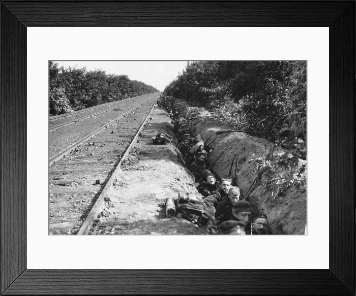 Framed Print : World War One - Belgian troops wait in a trench beside a railway line as they advance
