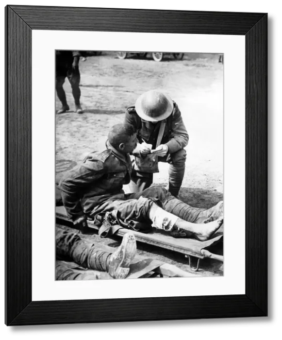 Framed Print : British chaplain taking the names of wounded soldiers 1916 after the Battle of the Somme Framed Print : British chaplain taking the names of wounded soldiers 1916 after the Battle of the Somme