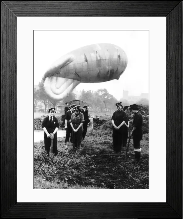 Framed Print : Girls on a north west of England balloon barrage site join in morning prayers. WW2 1942 Framed Print : Girls on a north west of England balloon barrage site join in morning prayers. WW2 1942