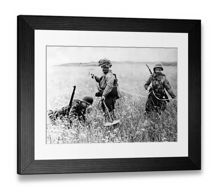 Framed Print : American soldiers searching a field in Northern France for landmines