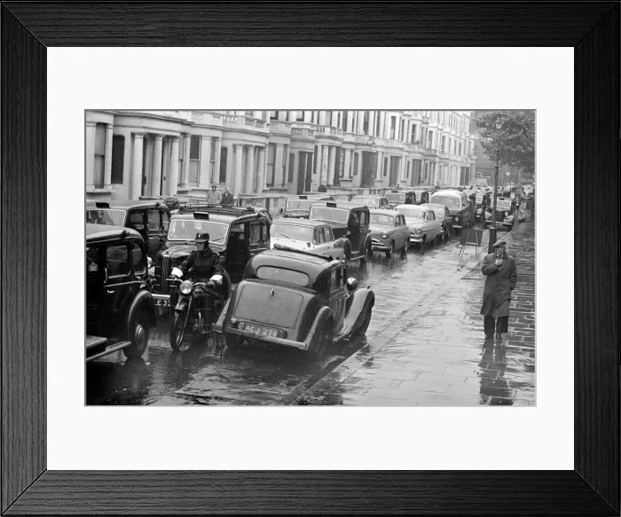 Framed Print : Congestion around a wet Earls Court in London where the 1959 Motor Show is taking place Framed Print : Congestion around a wet Earls Court in London where the 1959 Motor Show is taking place