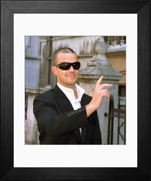Framed Print : Robbie Williams at the High Court July 1997 Williams is being sued by former Take That