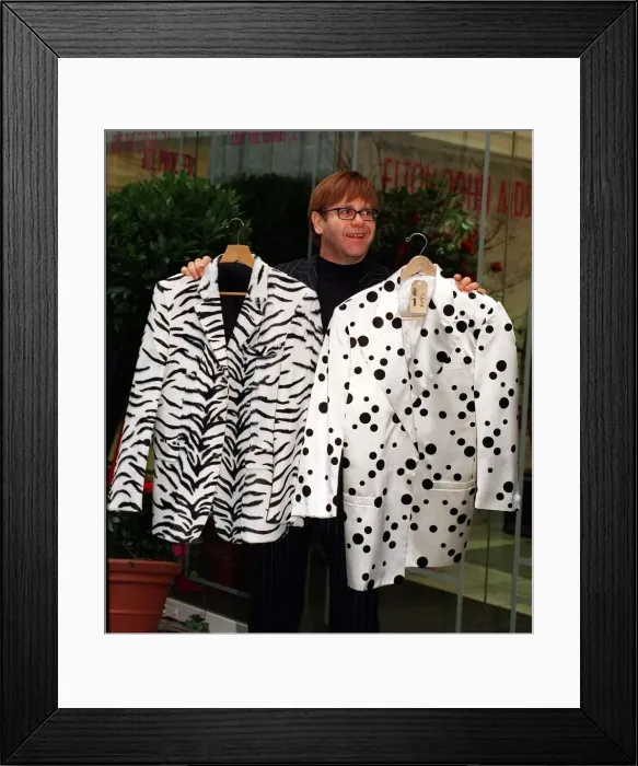 Framed Print : Elton John in his shop in Dover Street November 1997 - where he is selling some of his Framed Print : Elton John in his shop in Dover Street November 1997 - where he is selling some of his