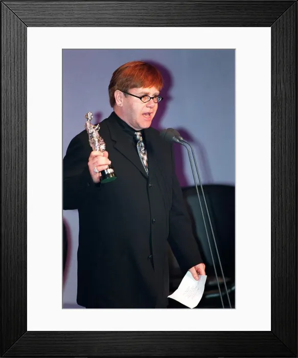 Framed Print : Singer Elton John at the Ivor Novello Awards at Grosvenor House in Park Lane London Framed Print : Singer Elton John at the Ivor Novello Awards at Grosvenor House in Park Lane London
