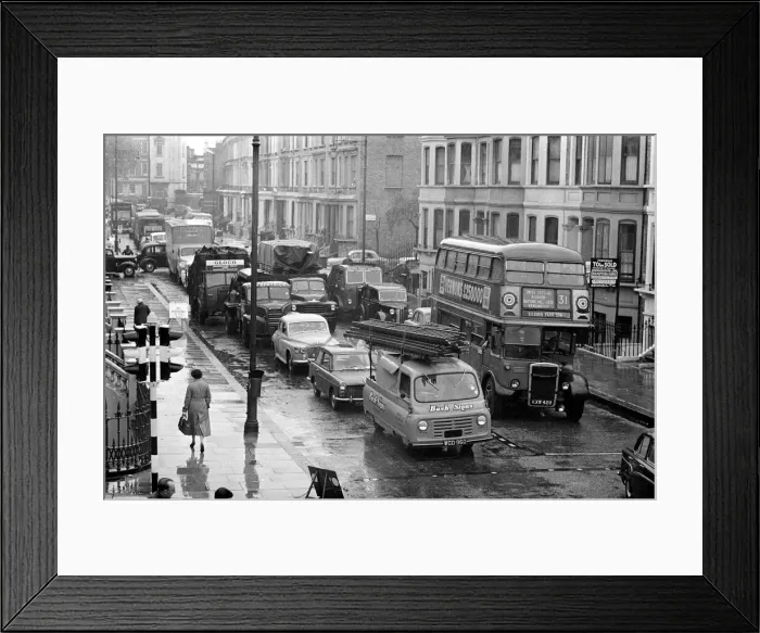 Framed Print : Congestion around a wet Earls Court in London where the 1959 Motor Show is taking place Framed Print : Congestion around a wet Earls Court in London where the 1959 Motor Show is taking place
