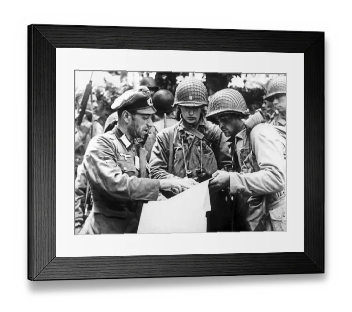 Framed Print : German officer (a Georgian) explaining details of a military map to US officers from
