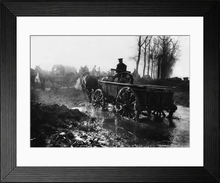Framed Print : World War One - A soldier drives a horse and supply cart through water logged fields Framed Print : World War One - A soldier drives a horse and supply cart through water logged fields