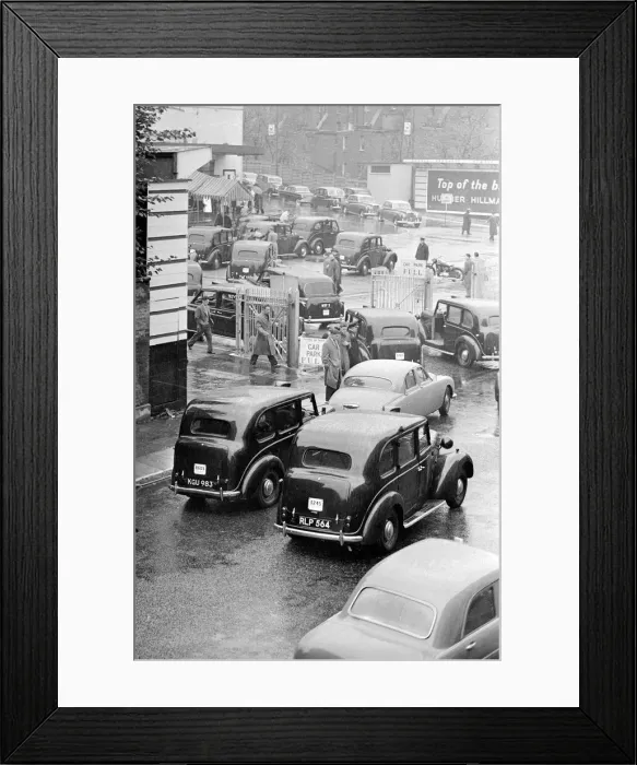 Framed Print : Congestion around a wet Earls Court in London where the 1959 Motor Show is taking place Framed Print : Congestion around a wet Earls Court in London where the 1959 Motor Show is taking place