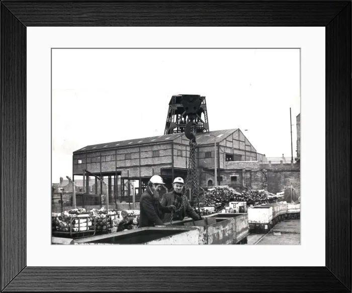 Framed Print : Jimmy Weatherby (left) and Alan Nelson unload equipment salvaged from Elemore Colliery