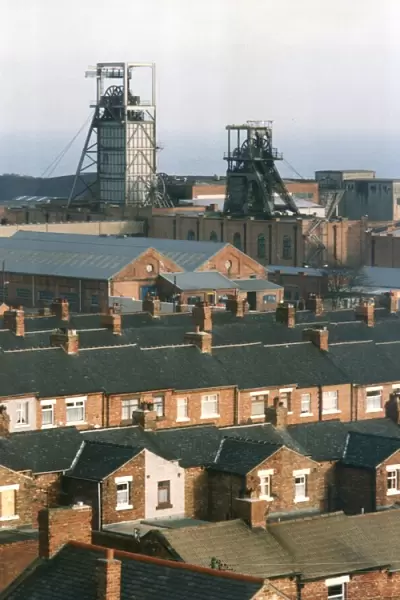 Terraced streets of Easington with the gear towers of the local pit head in