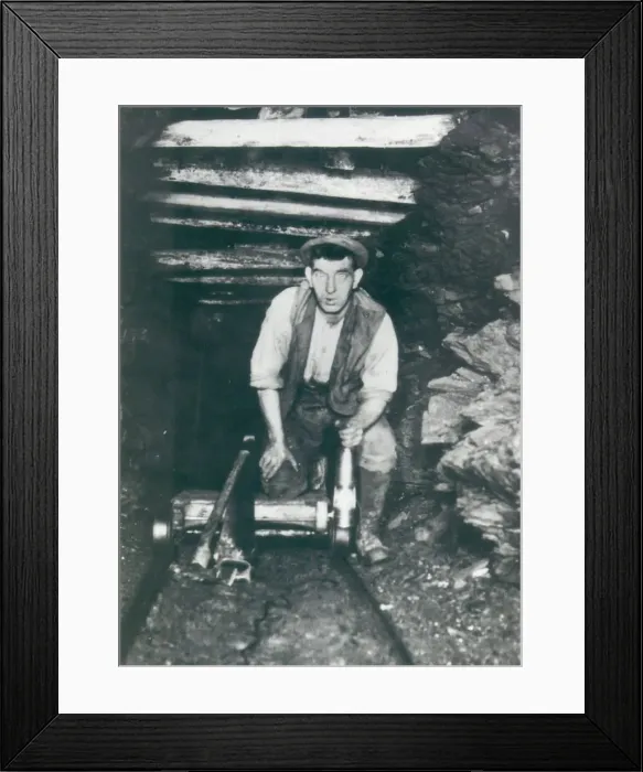 Framed Print : A man works a seam at Willington Colliery in about 1930 Framed Print : A man works a seam at Willington Colliery in about 1930