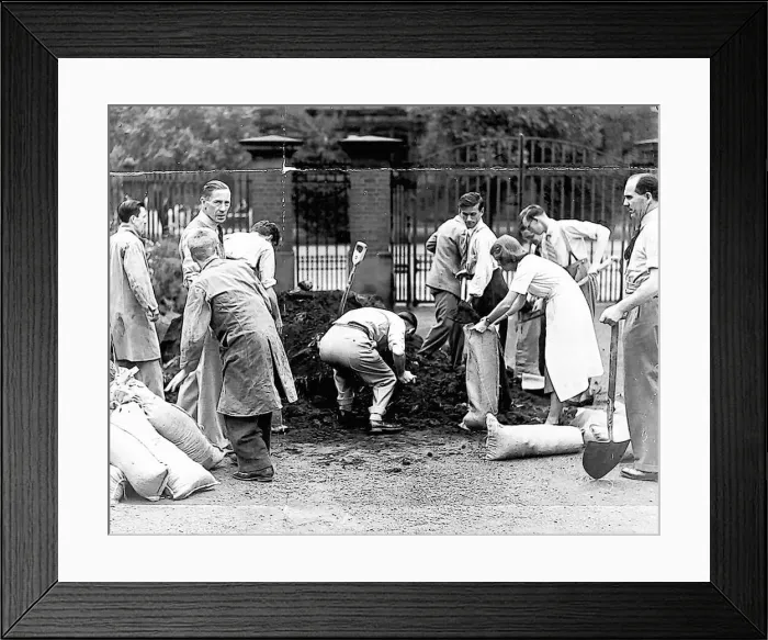 Framed Print : Students are employed to fill bags with soil to protect Newcastle Dental Hospital in case Framed Print : Students are employed to fill bags with soil to protect Newcastle Dental Hospital in case
