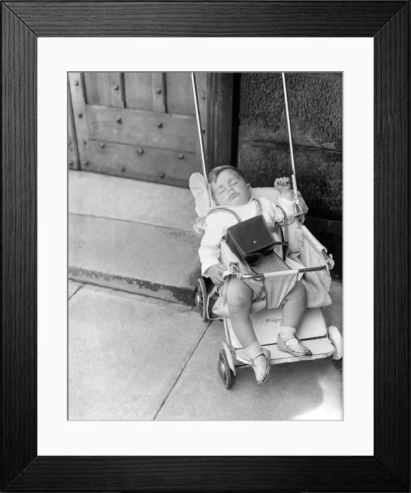 Framed Print : A sleeping child at the Durham Miners Gala in July 1962 Framed Print : A sleeping child at the Durham Miners Gala in July 1962