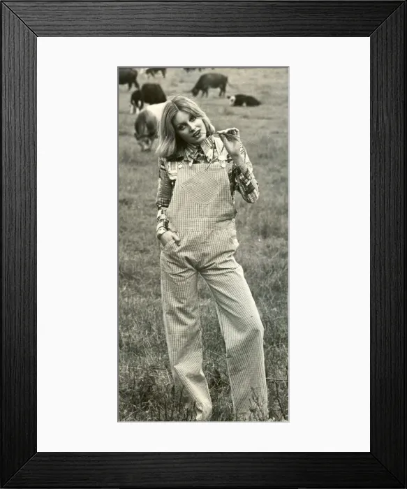Framed Print : A woman wearing dungarees Framed Print : A woman wearing dungarees