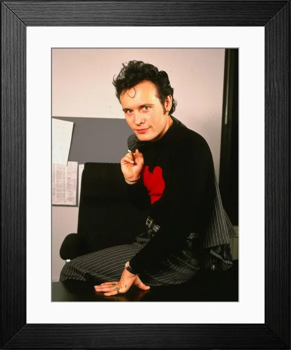 Framed Print : Adam Ant pop singer January 1990 Sittingon desk black jumper red heart striped Framed Print : Adam Ant pop singer January 1990 Sittingon desk black jumper red heart striped