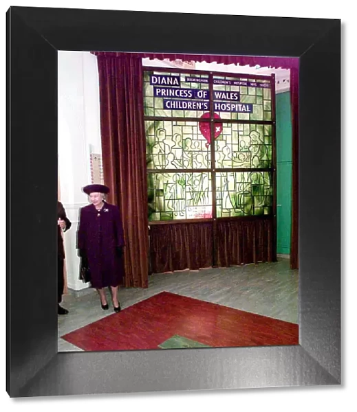 The Queen unveils a commemorative stained glass window at the Birmingham Children