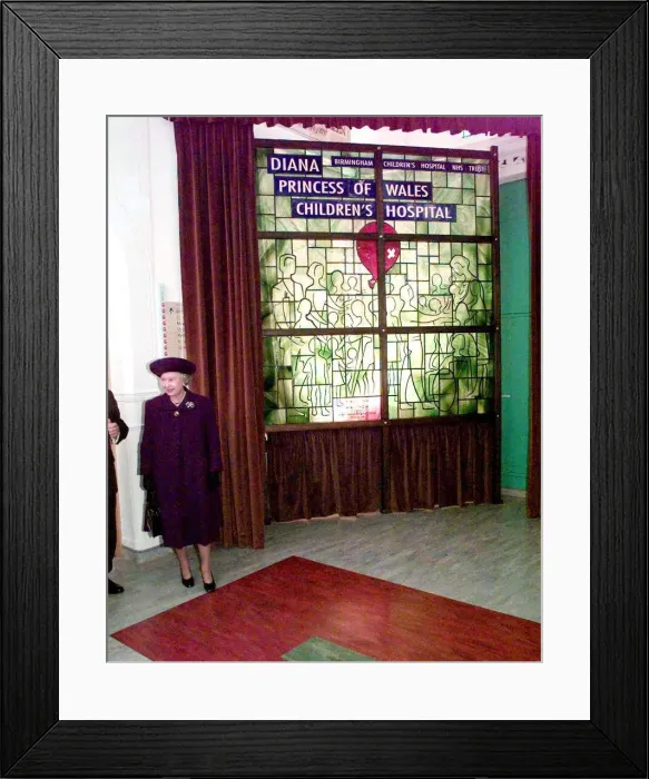Framed Print : The Queen unveils a commemorative stained glass window at the Birmingham Children Framed Print : The Queen unveils a commemorative stained glass window at the Birmingham Children