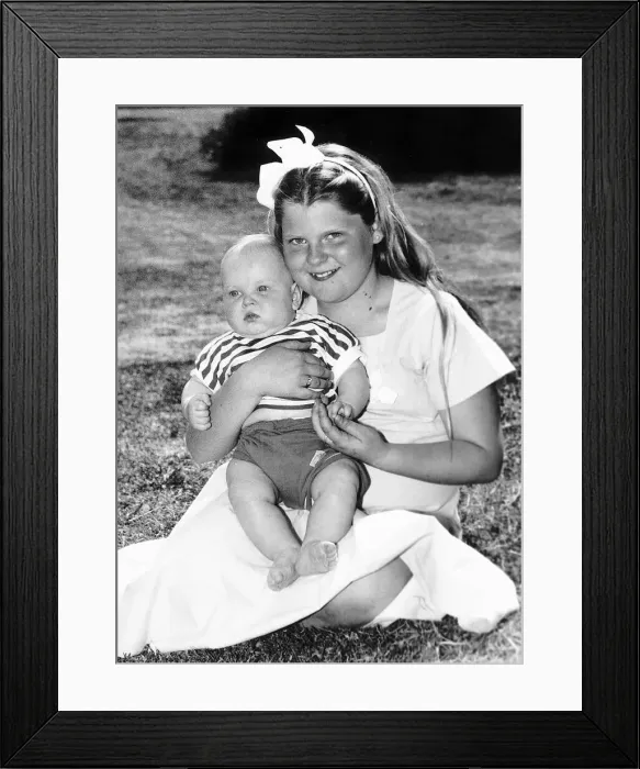 Framed Print : Louise Brown Test Tube Girl holding 6 month old Andrew Machea on her lap May 1989 Framed Print : Louise Brown Test Tube Girl holding 6 month old Andrew Machea on her lap May 1989
