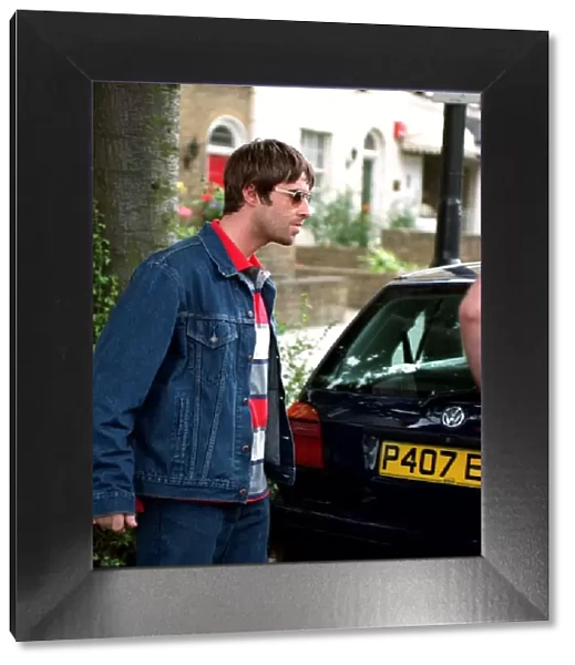 Liam Gallagher of Oasis leaves his house July 1997 after his latest row with actress wife