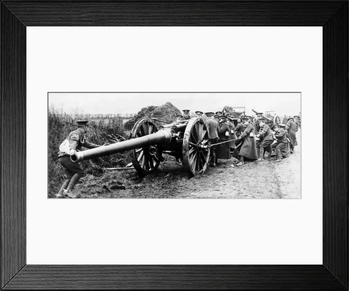 Framed Print : British gunners struggle to pull a 60 pounder field gun into position during World War Framed Print : British gunners struggle to pull a 60 pounder field gun into position during World War