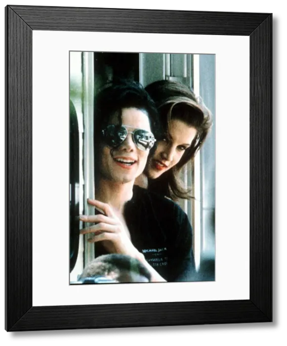 Framed Print : Michael Jackson pop Singer wearing dark glasses With Lisa Marie Presley Framed Print : Michael Jackson pop Singer wearing dark glasses With Lisa Marie Presley