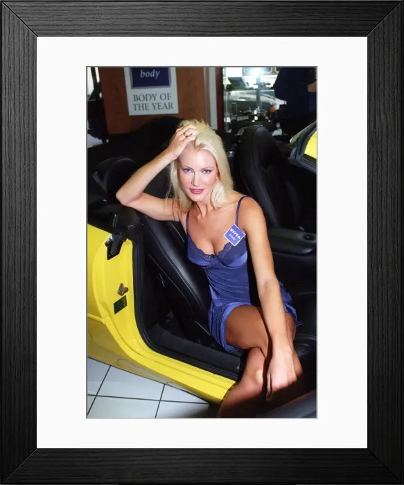 Framed Print : Caprice Bourret Supermodel September 1997 takes a seat in one of the Aston Martin Framed Print : Caprice Bourret Supermodel September 1997 takes a seat in one of the Aston Martin