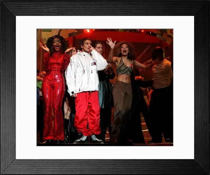: Spice Girl Mel B dancing and singing on stage at the 1996 Smash Hits Pole Winners Party : Spice Girl Mel B dancing and singing on stage at the 1996 Smash Hits Pole Winners Party