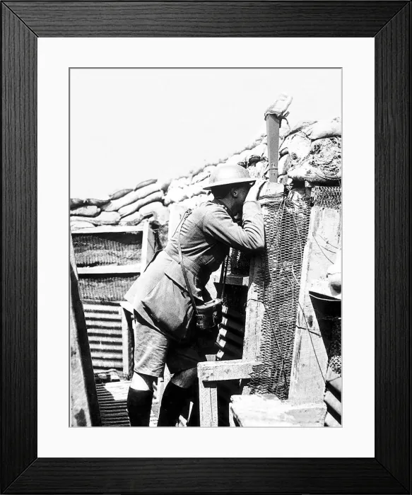 Framed Print : World War One ANZAC Australian officer watches the enemy through a periscope during Framed Print : World War One ANZAC Australian officer watches the enemy through a periscope during