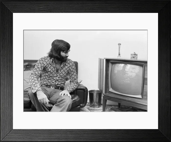 Framed Print : George Best seen here at his Manchester home after rumours that Stoke manager Tony Framed Print : George Best seen here at his Manchester home after rumours that Stoke manager Tony