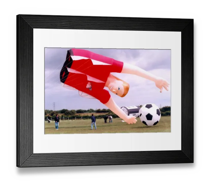Framed Print : A participant in the annual kite festival at Washington in July 1996 Framed Print : A participant in the annual kite festival at Washington in July 1996