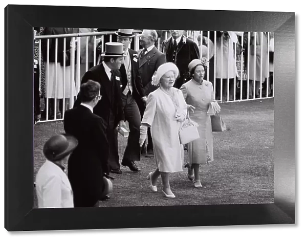 The Queen Mother June 1980 And Princess Margaret walking down the race course at