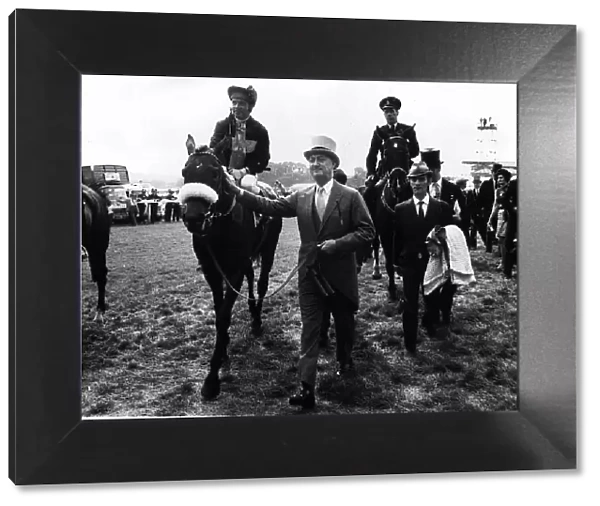 Geoff Lewis jockey on Mill Reef led by Paul Mellon owner after winning The Derby at Epsom