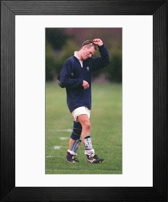 Framed Print : Peter Phillips walking of field after trial for Scottish schoolboy team at Murrayfield