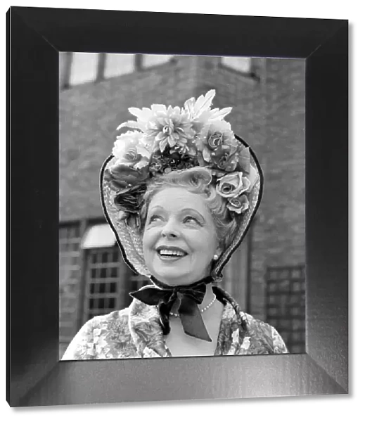 Model and actress Iris Greenwood of Chelsea, aged 63 wearing a bonnet March 1959